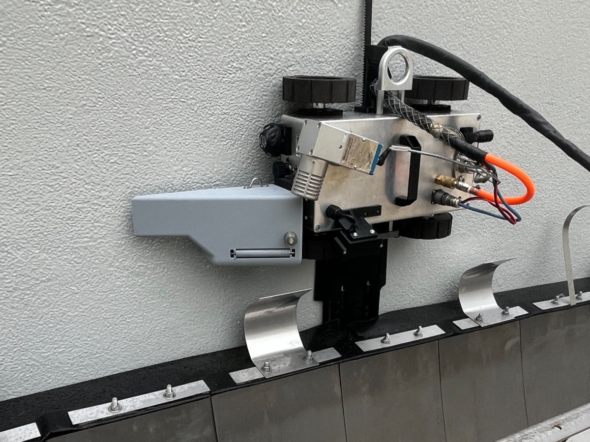 Texas Engineer Connor Crawford's Pike Robotics wall crawling robot on a wall