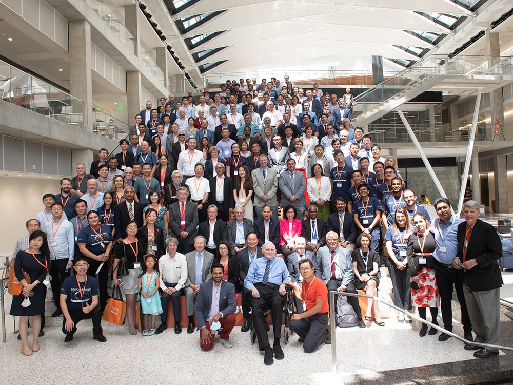 John Goodenough with crowd in Cockrell's Engineering Education and Resource Center