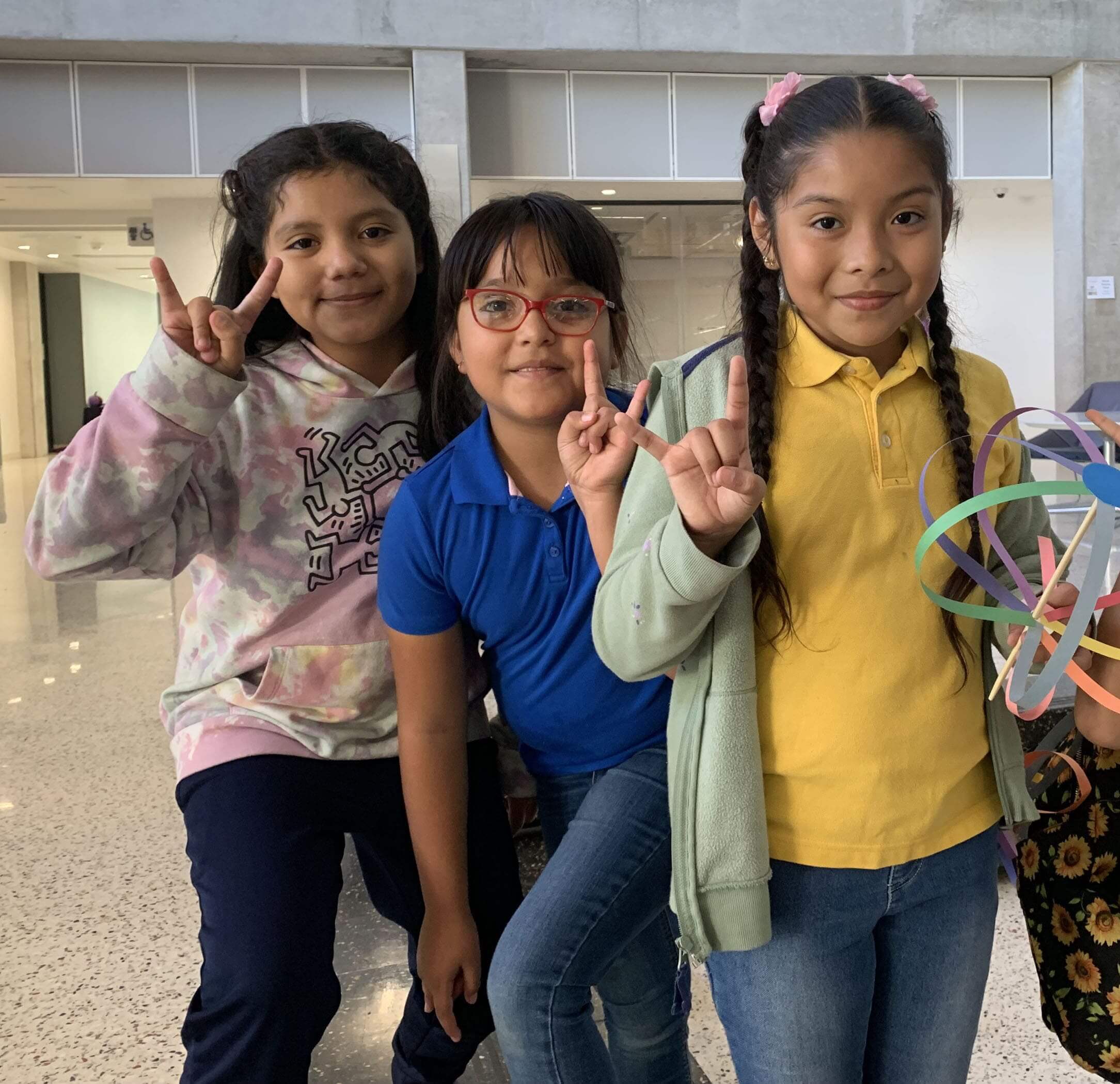 children doing hook 'em horns