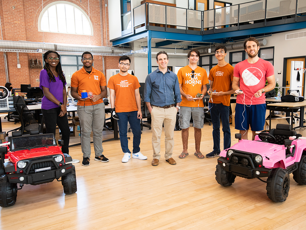 James Sulzer and students in lab