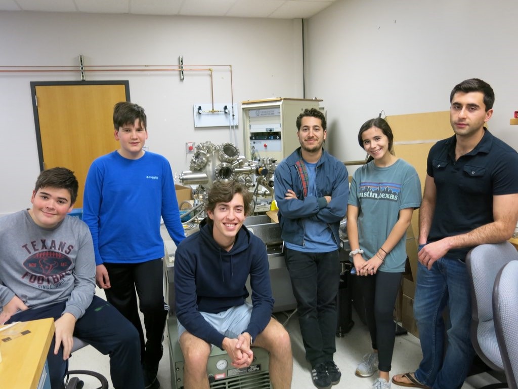 Texas Engineer Gabriel Cossio and high school students in his lab