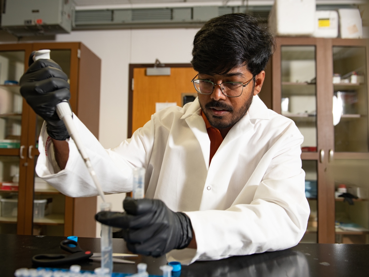 A Texas Engineering student in the lab