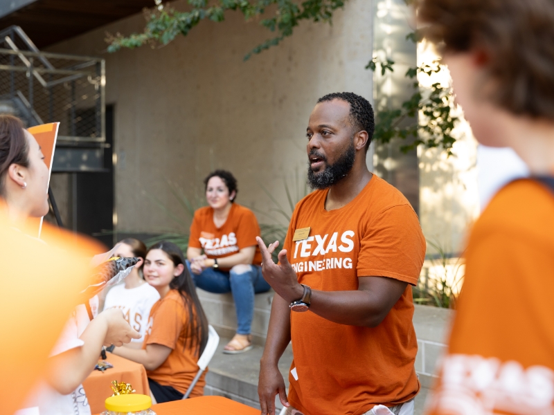 Texas engineering students gathered around Equal opportunity in Engineering booth