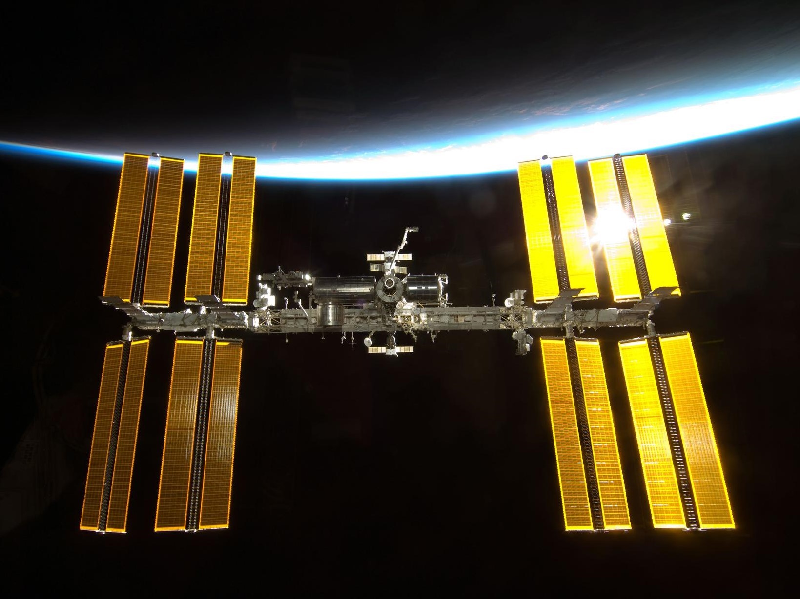 Backdropped by Earth’s horizon and the blackness of space, the International Space Station is featured in this image photographed by an STS-130 crew member as space shuttle Endeavour and the station approach each other during rendezvous and docking activities.