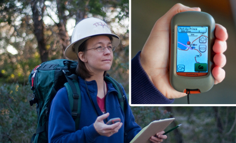 Texas Engineer Ellen Rathje holding GPS device in a forest