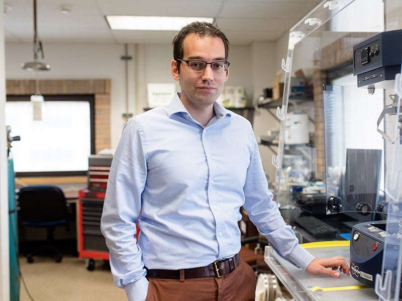 Texas Engineer Filippo Mangolini standing in his research lab