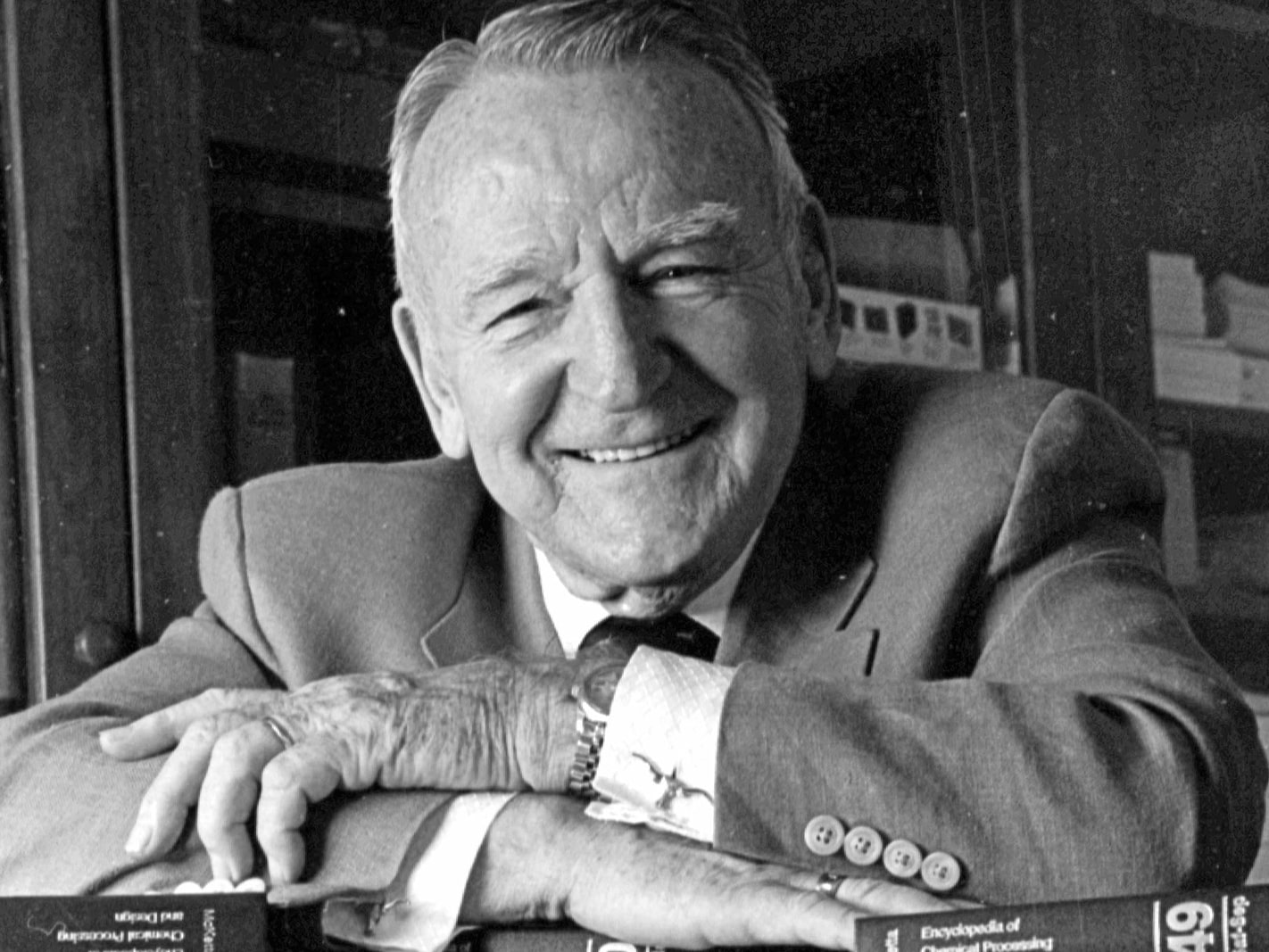 Black and white photo of John McKetta smiling