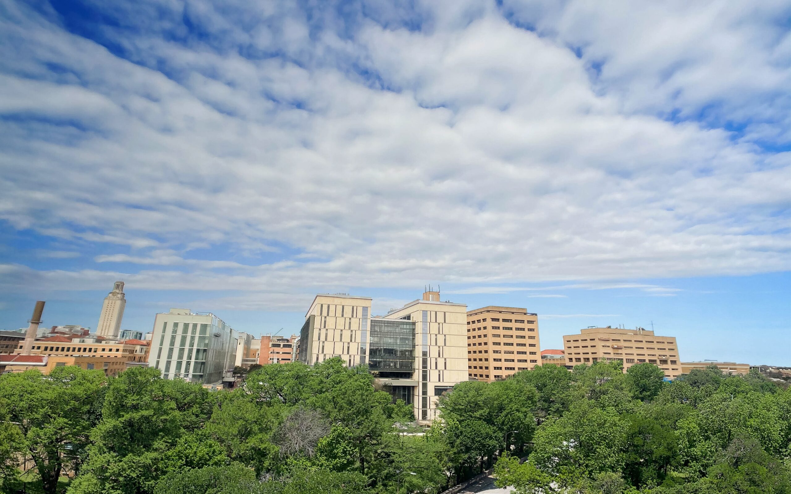 view of engineering campus with sky and trees