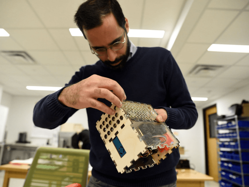 Sepehr Bastami builds a device to collect environmental data.