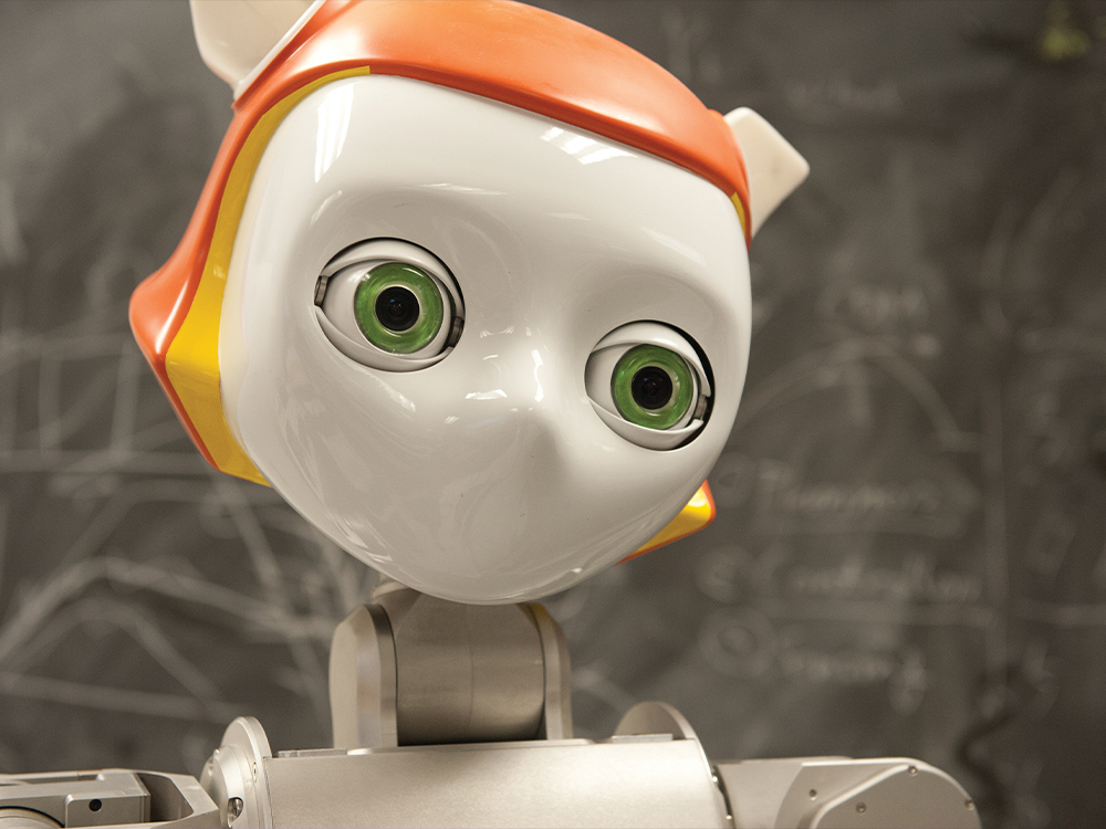 White and orange humanoid robot