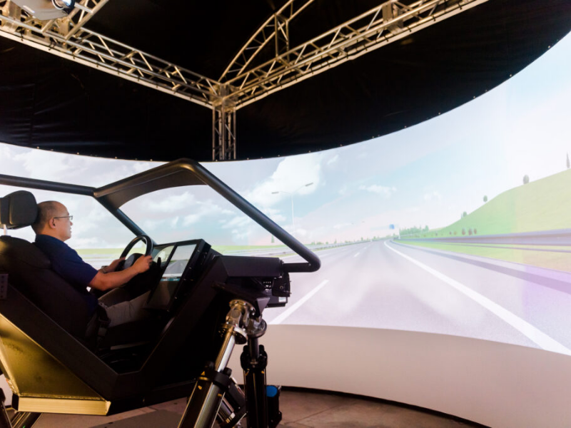 Texas Engineer sitting in driving simulator