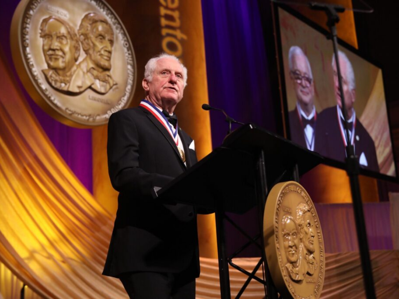 Texas Engineer James Truchard speaking at podium