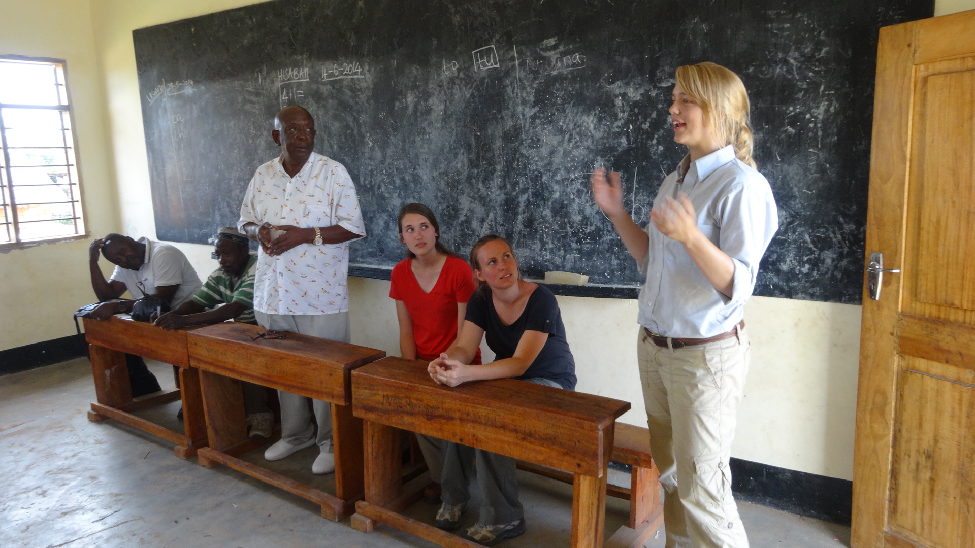 Student presenting in Tanzania to local students.