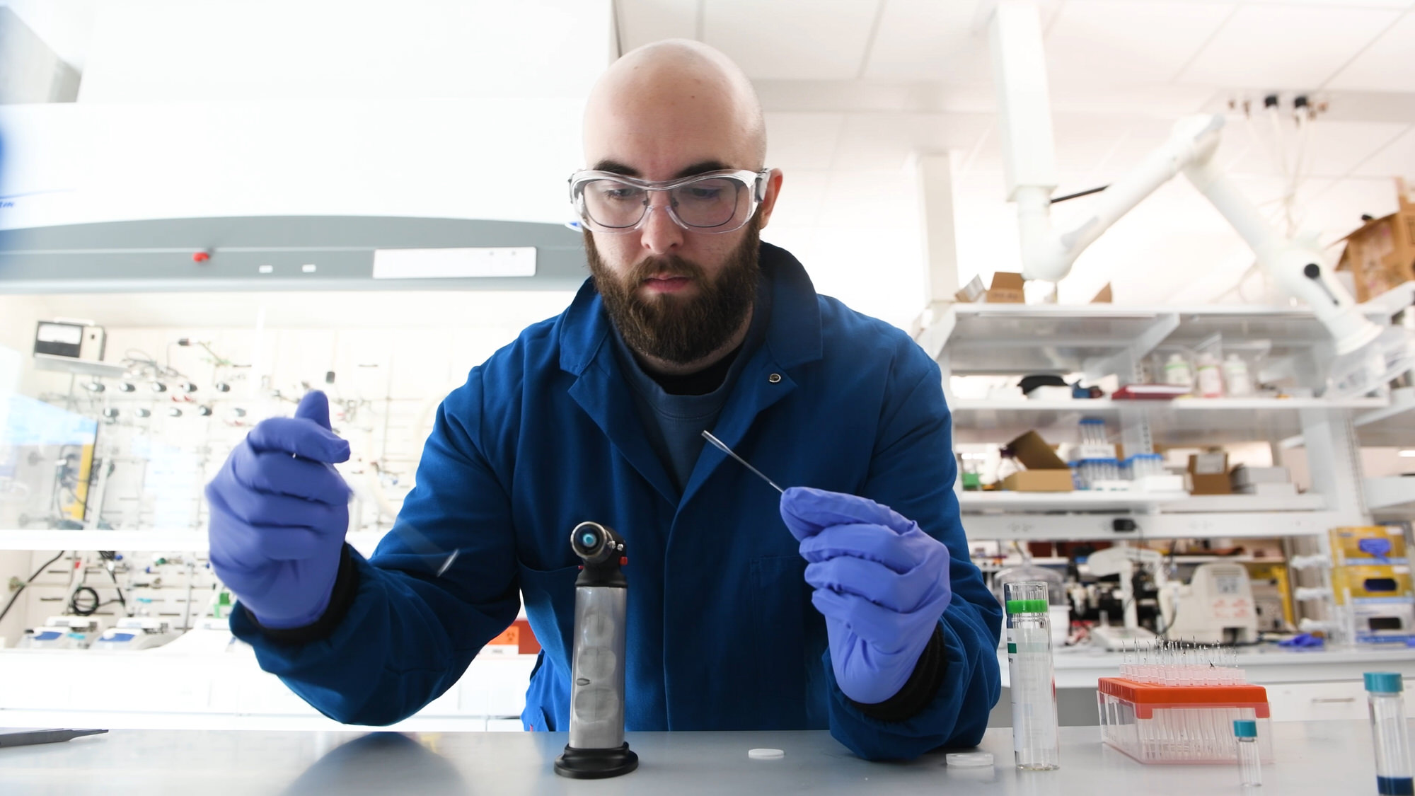 Student in Milliron Lab works at bench