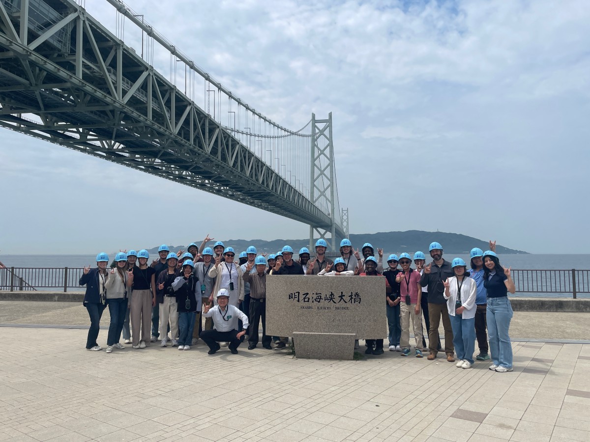 A cohort of UT students and Professor of Practice Gregory Brooks, tour the Akashi Kaikyo bridge with Satoshi Kashima while in Japan for the Emerging Technologies study abroad program.