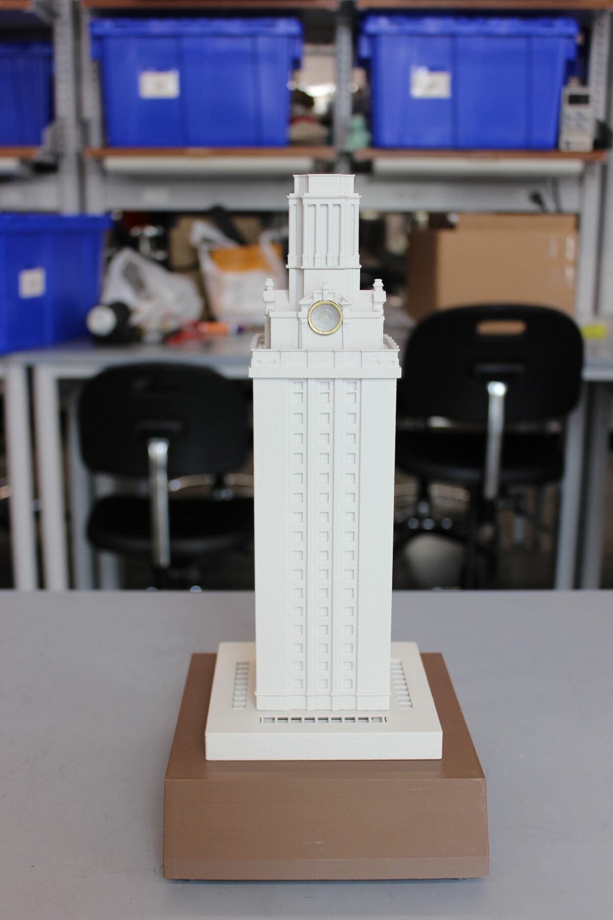 Texas Inventionworks staffer Andrew Jones worked on a mini tower for investors in the tower restoration project.
