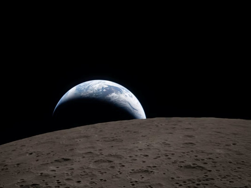 Earthset captured through the Orion spacecraft window during the Artemis II crew’s flyby of the Moon. 