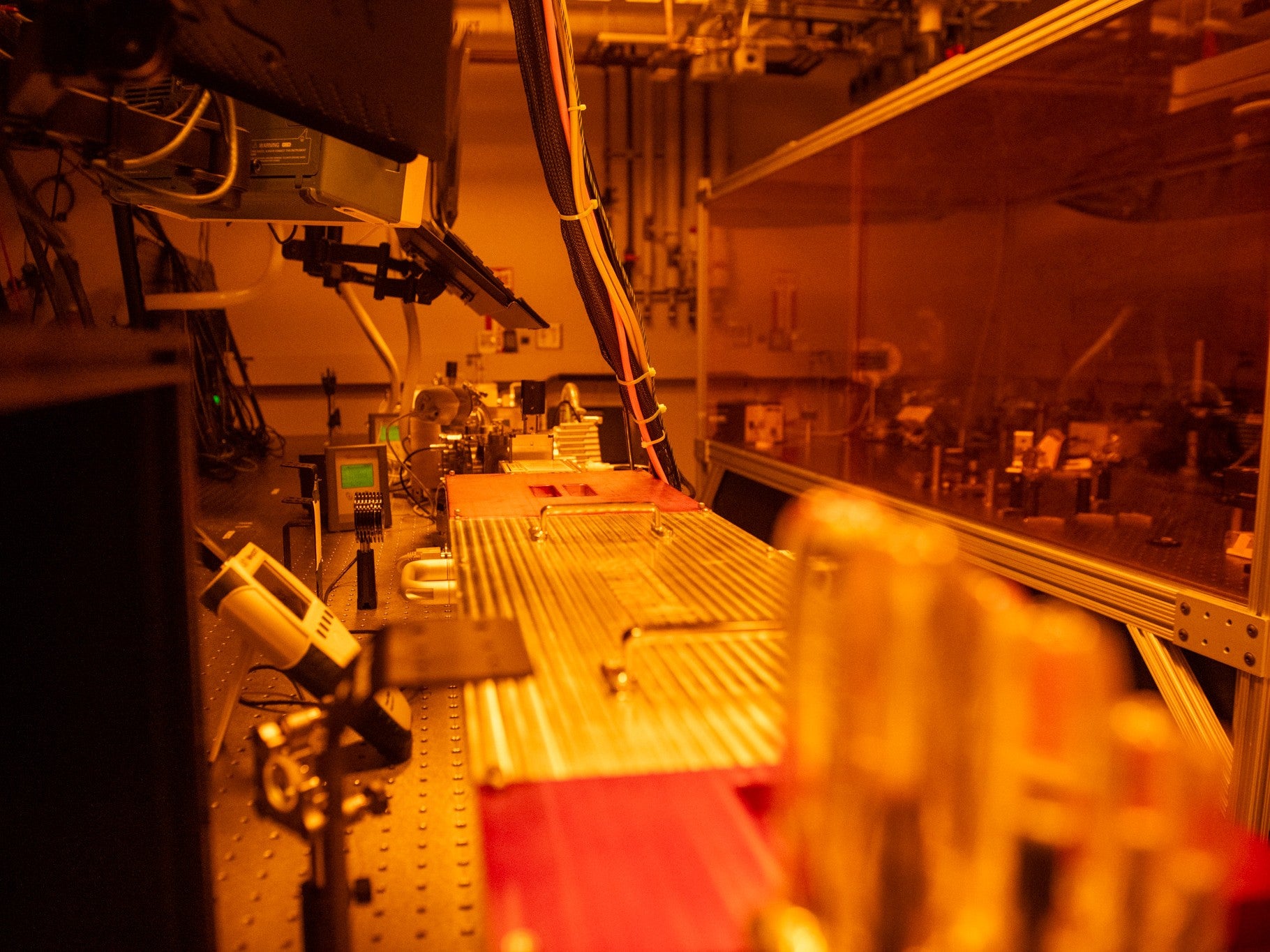 A tabletop lithography device in a semiconductor lab.