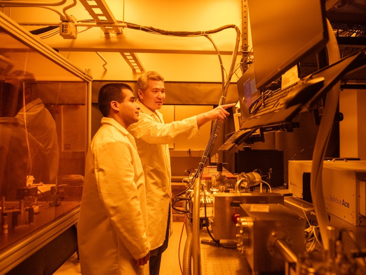 Texas Engineer Chih-Hao Chang and a student in his lab.
