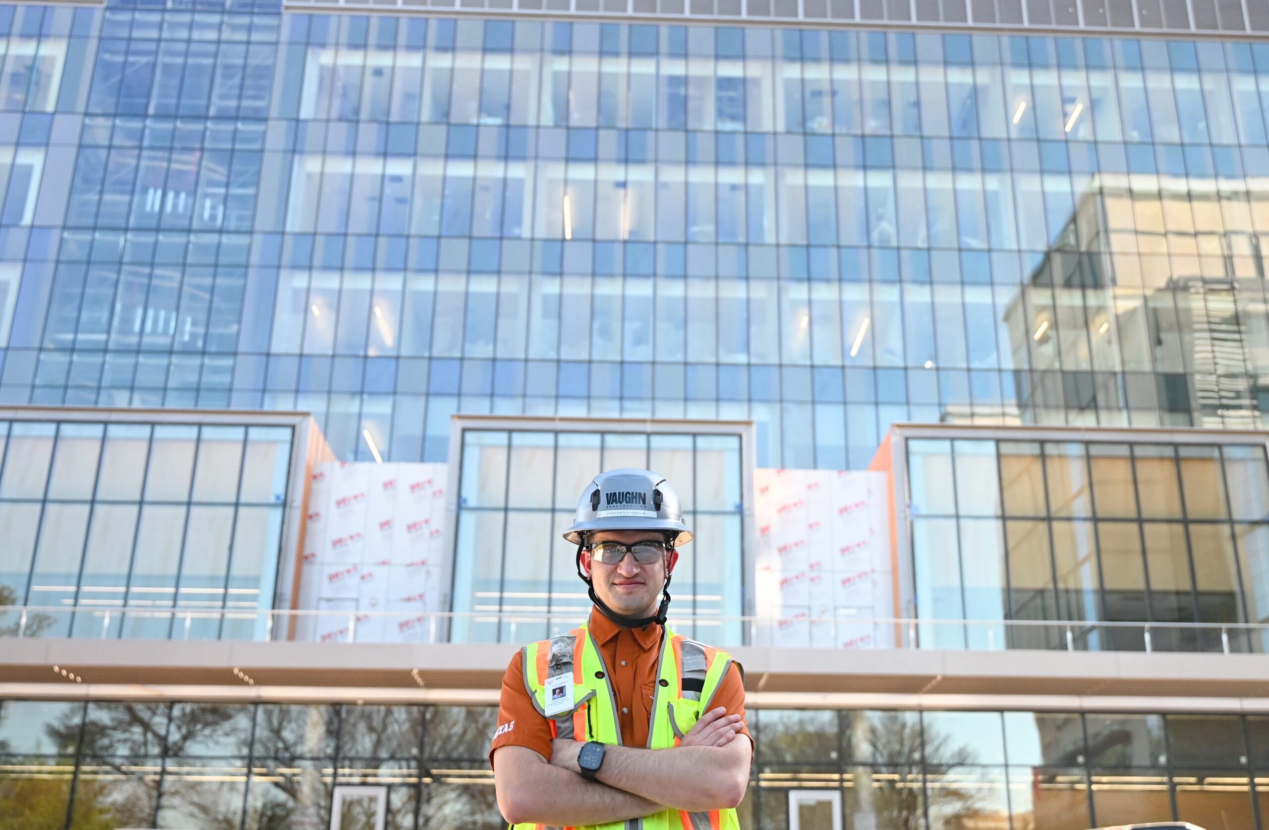 Texas Engineer Carlos CdeBaca poses in front of ACS building