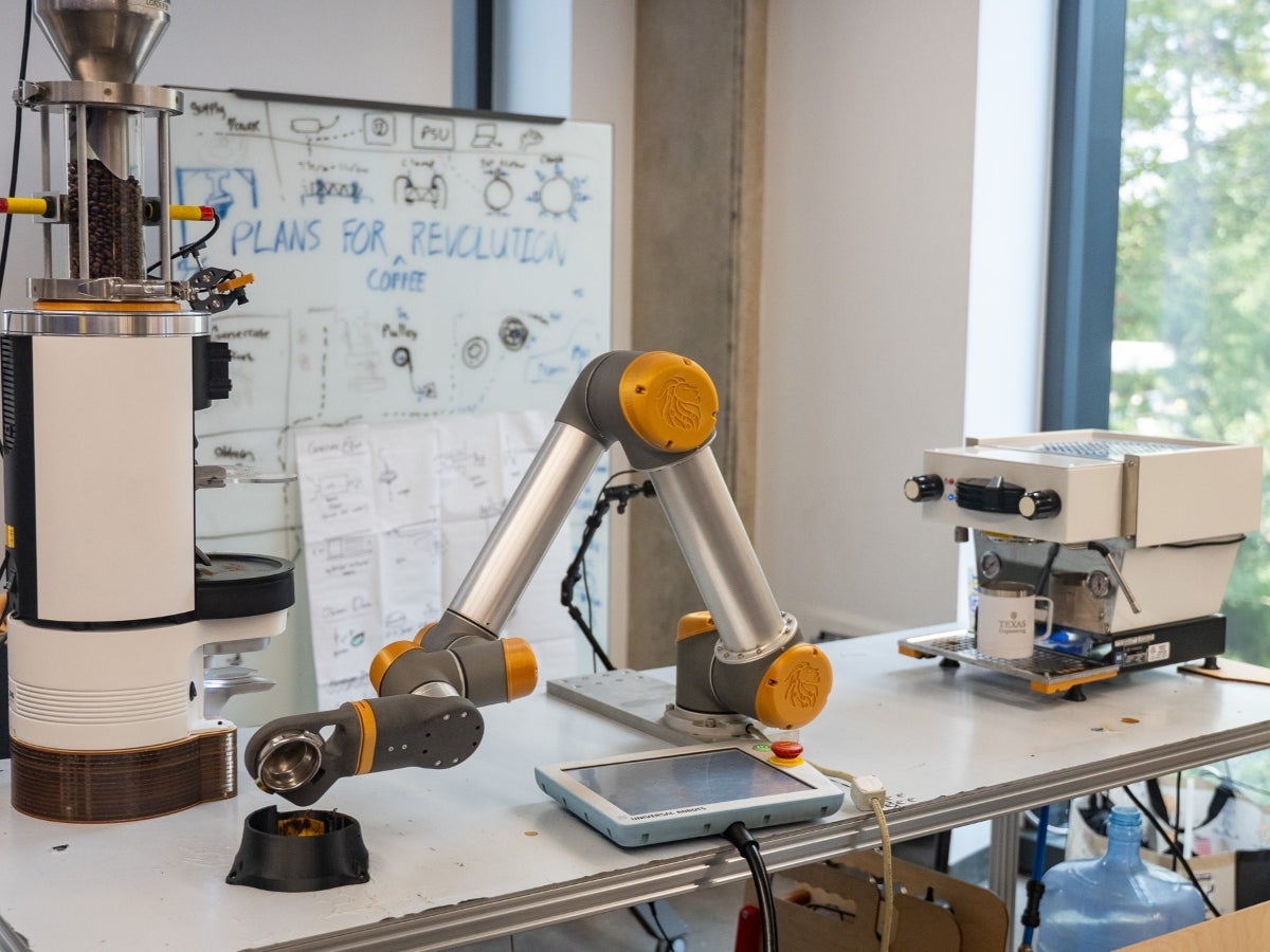 A robotic arm that can make espresso in a lab.