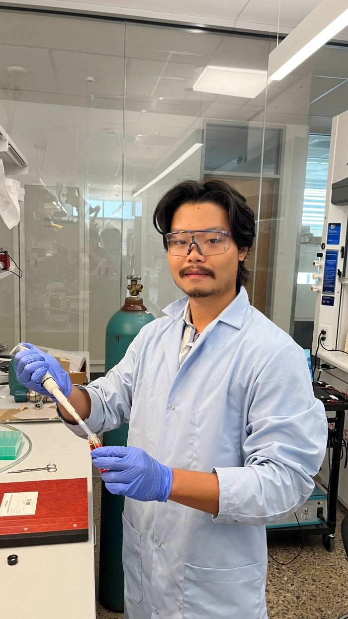 Texas Engineering graduate student Tianrui (Terry) Zheng in the lab.