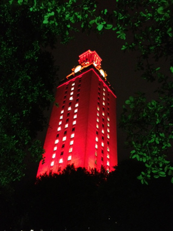 UT Tower lit up with 100 in the windows