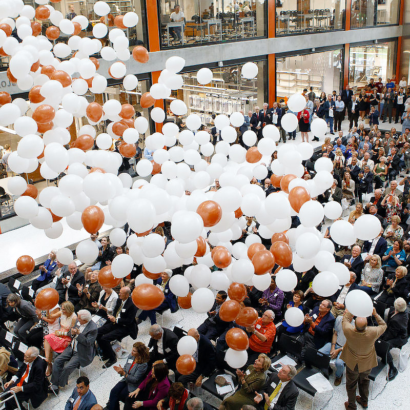 Balloons drop during EER event.
