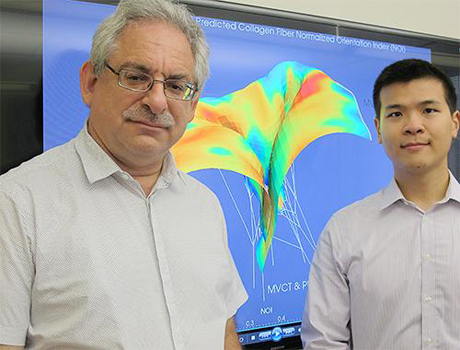 Texas Engineer Michael Sacks and student in front of screen